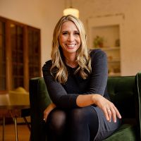 Christine-GreenChair-Square.jpg